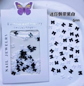 Charm Nơ Trắng - Đen .